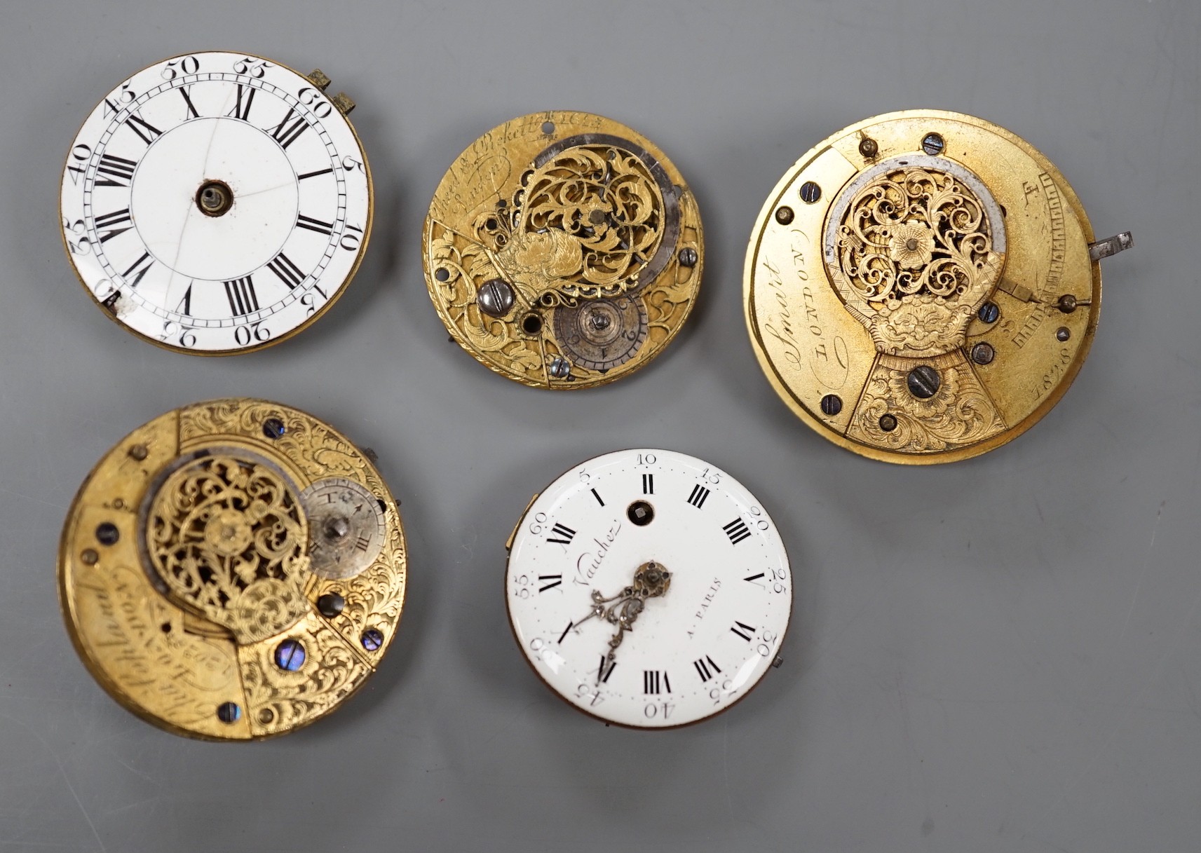 Five assorted 19th century pocket watch movements/accessories including English by Smart of London and French by Vaucher of Paris.